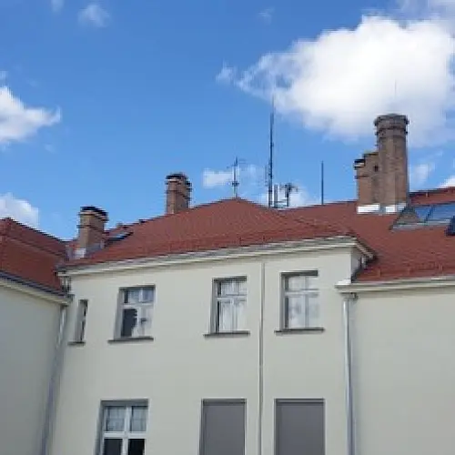 Część 1 - Wymiana pokrycia dachowego budynku UMG Rawicz wraz z ociepleniem i montażem instalacji fotowoltaicznej